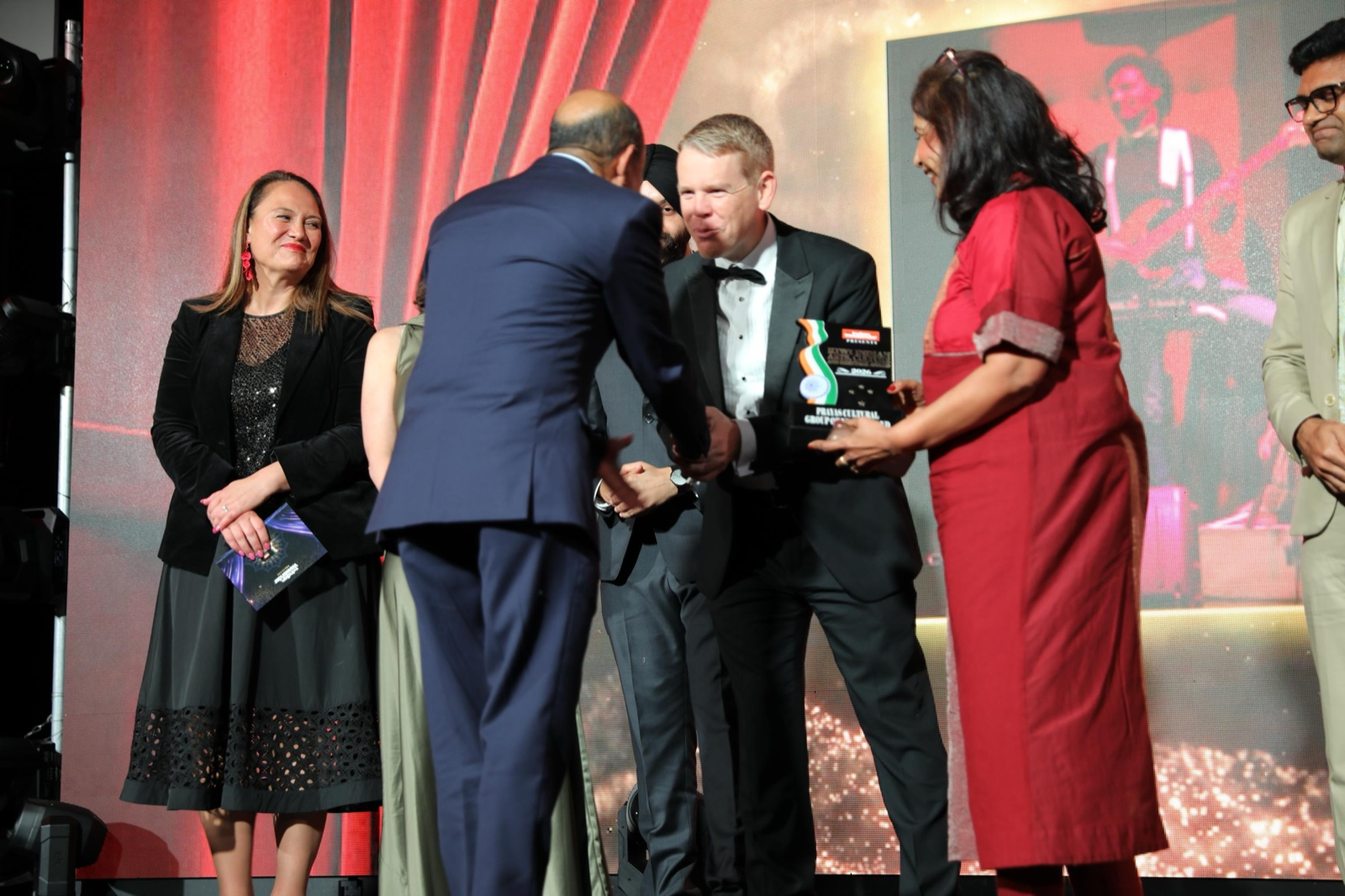 The award presentation on stage at the Cordis Auckland